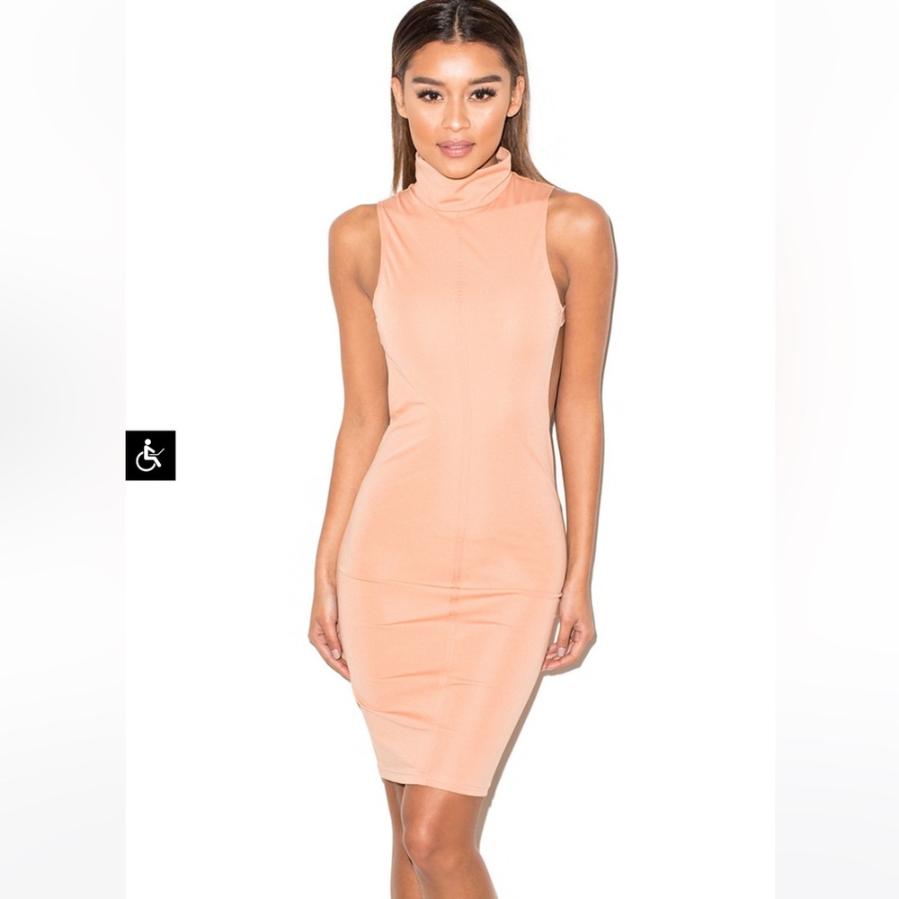 Mistress rocks backless dress sz M worn once